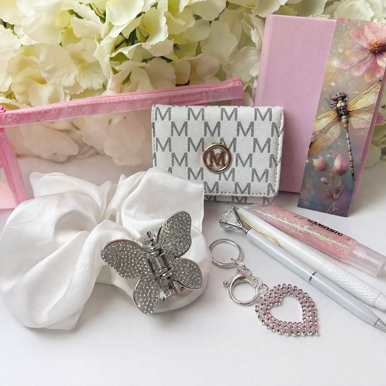 White not have a little Pink.                   Available in white with pink & silver        Or All White with gold .